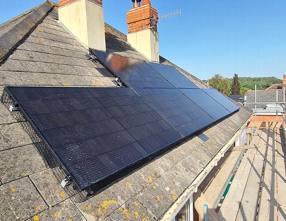 solar panels being installed on home roof